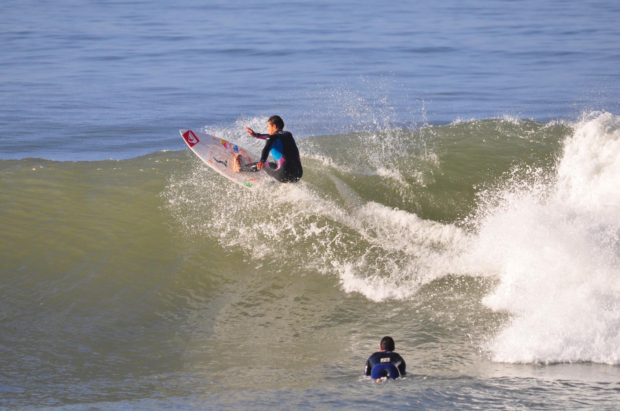 students catching waves