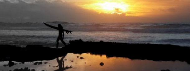 surfing fitness assessment at sunset