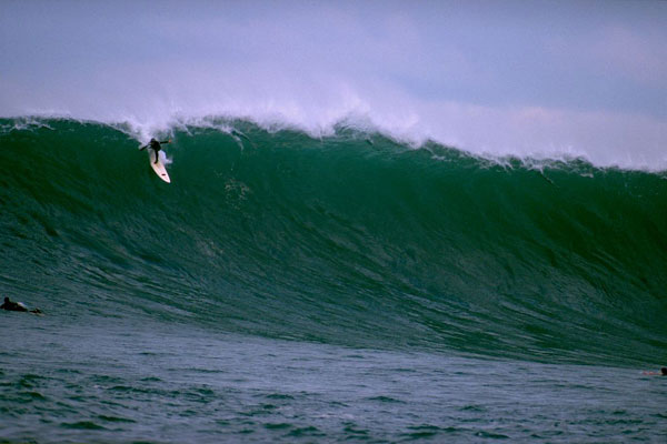 Tony Butt takes off on a serious wave