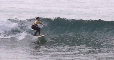 Young Club Member Surfing
